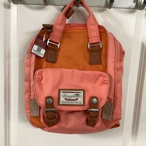 Chic Pink and Orange Canvas Backpack with Vintage Accents